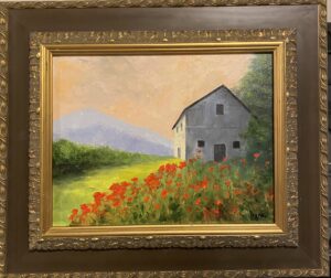 Painting of a sunlit barn with golden fields in the background by Henry Leck, framed in gold.