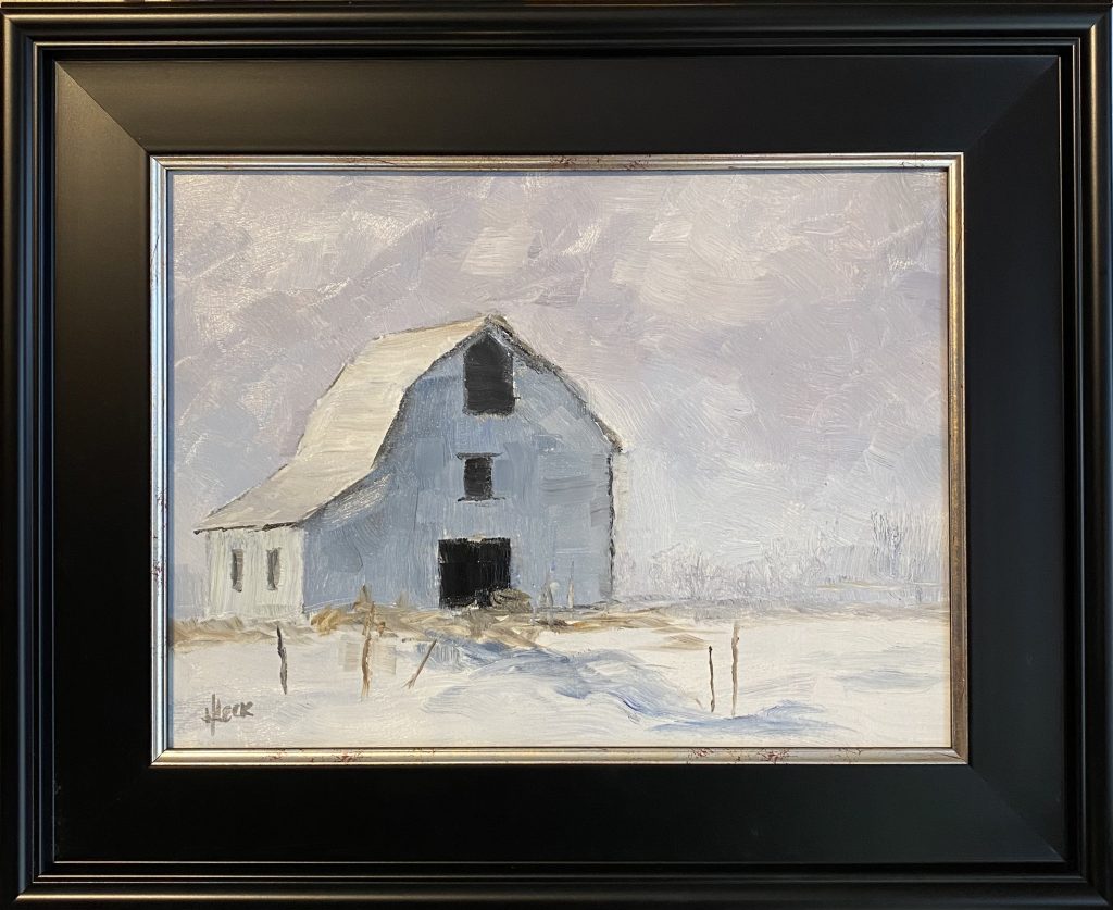 Framed oil painting titled 'Tranquil Barn' by Henry Leck, featuring a peaceful snow-covered barn in a serene winter landscape.