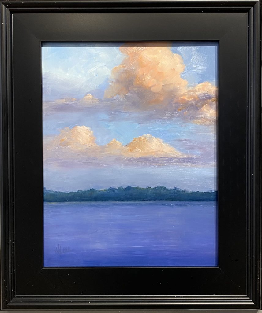 Framed oil painting titled 'Ethereal Clouds' by Henry Leck, featuring a tranquil lake with billowing golden clouds in a soft blue sky.