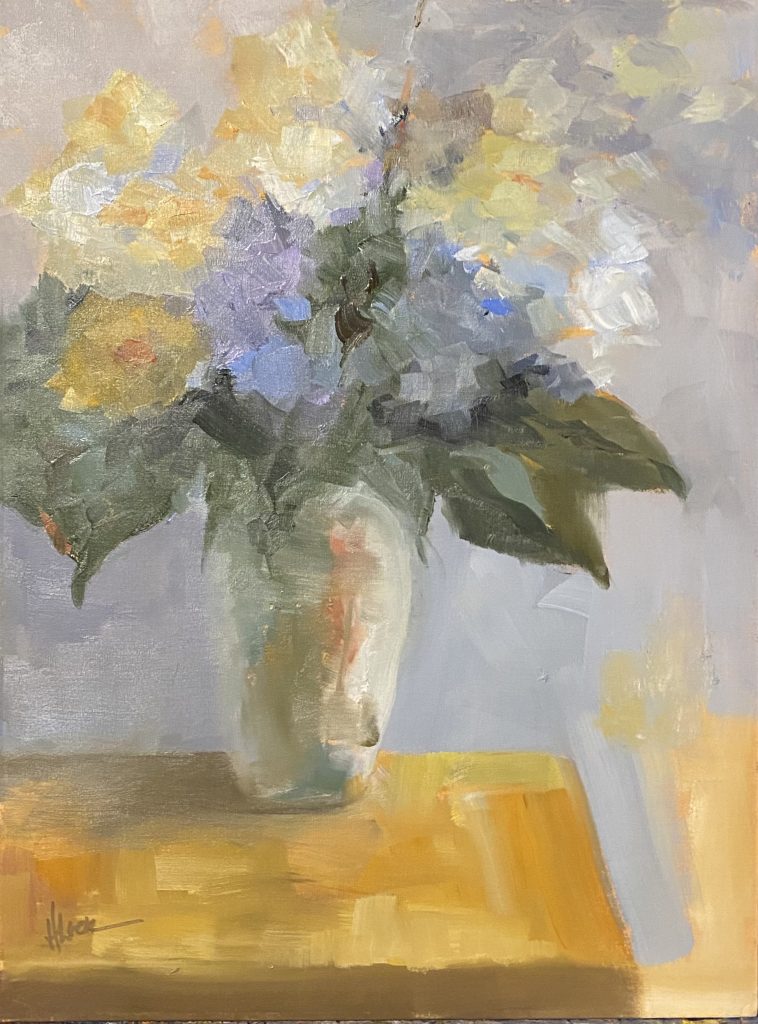 Impressionist-style still life painting of a floral bouquet in a pale ceramic vase with yellow, blue, and lavender blooms on a warm-toned table