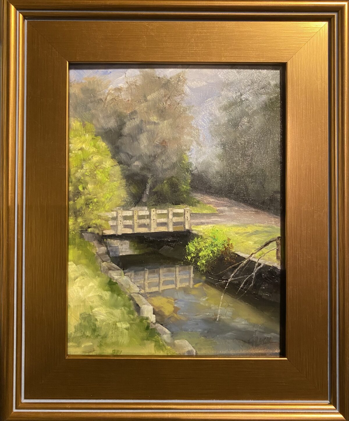 Oil painting of Lower Cascades Park showcasing a serene bridge over a tranquil stream surrounded by lush greenery, by artist Henry Leck.