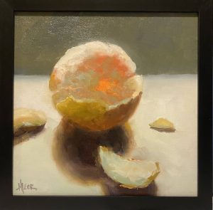 Still life oil painting by Henry Leck titled "Orange Glow – 2," featuring a peeled orange on a white surface with warm shadows